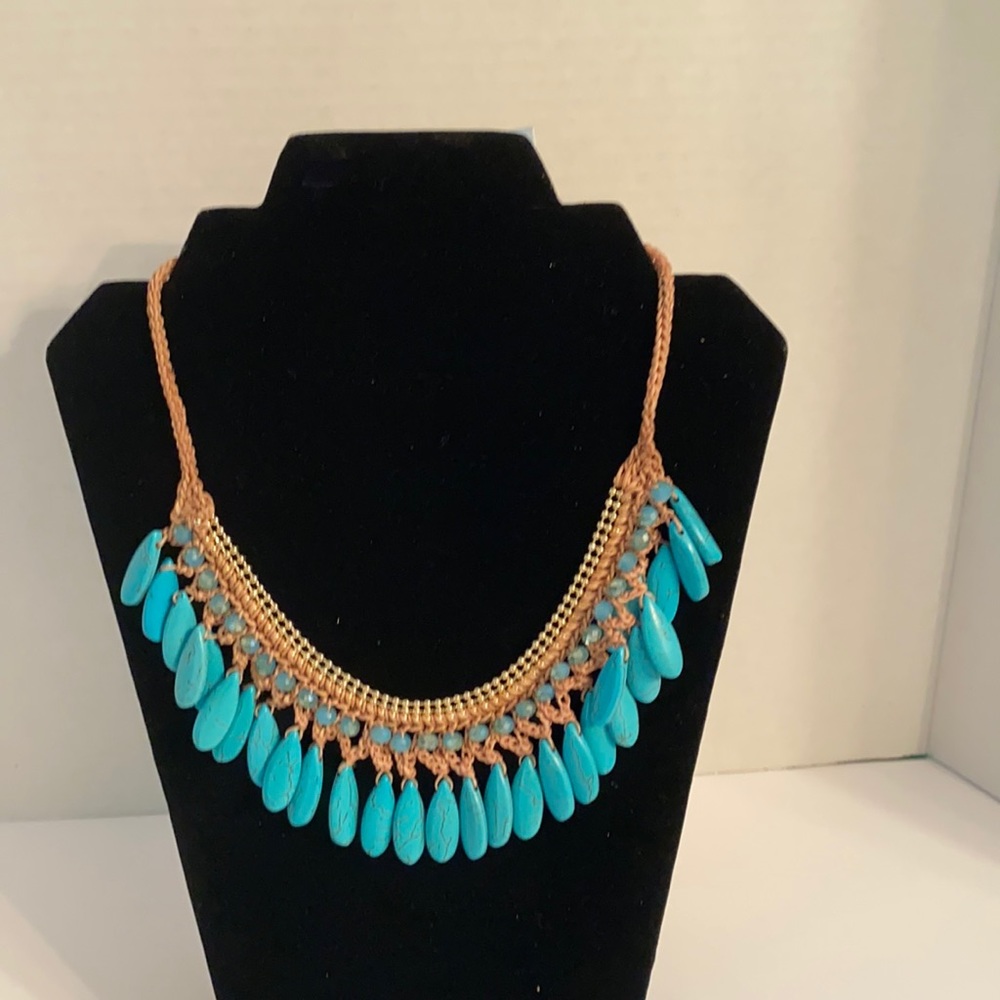 Turquoise (simulated) necklace. 28 inches long.